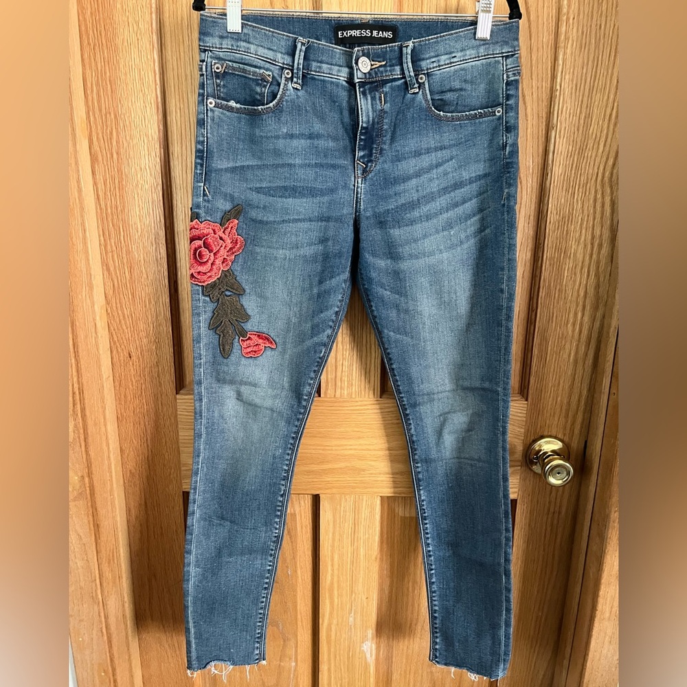 Express Blue Skinny Jeans with Red Floral Design